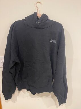 Men's Black Pullover Hoodie with Small Chest Graphic